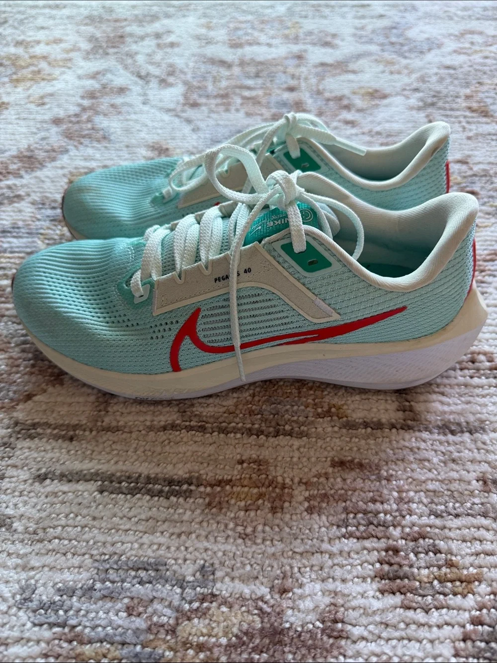 Light Aqua Nike Pegasus 40 Sneakers with Coral Accents